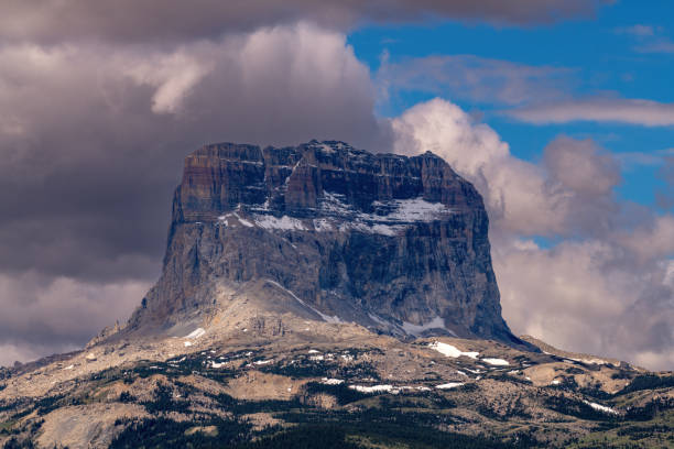 istock Chief mountain closeup with snow and cloudy sky 1437723704