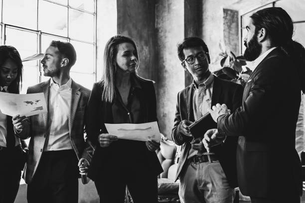 istock Multiracial business people working meeting inside modern office - Entrepreneur team - Black and white editing 1437726154