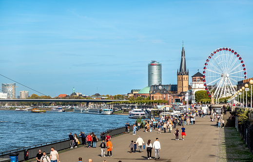 Dusseldorf, Germany: St. Lambertus Church and Schiffahrtmuseum with Rhein Rhine River Promenade and Tourists People in the Old Town