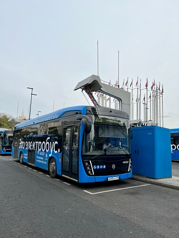 Moscow, Russia - September 11, 2022: Electric Bus charging on special charging station