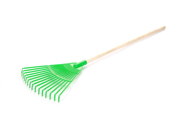 istock Closeup high angle shot of a leaf rake on a white surface 1437729678