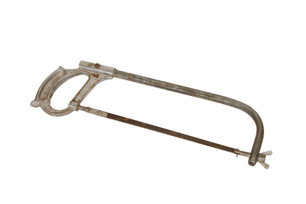istock Old and used rusty hacksaw isolated white background 1437730811