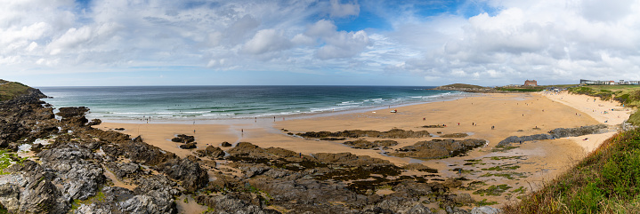 A panorama landscape of Fistral Beach in Newquay on a sunny late summer day