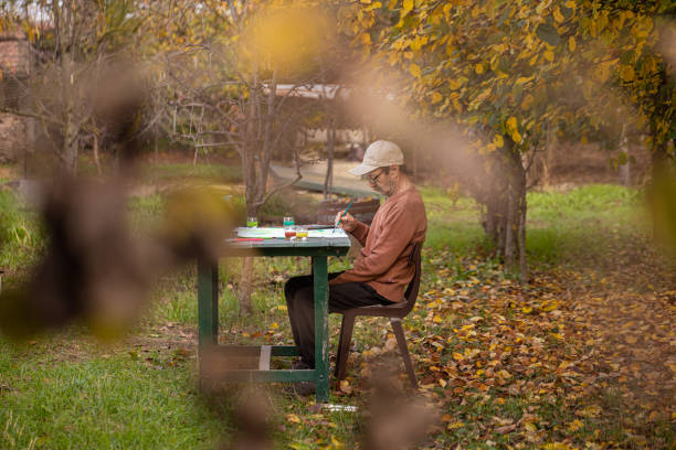 istock Artist working at his home art workshop 1437734018