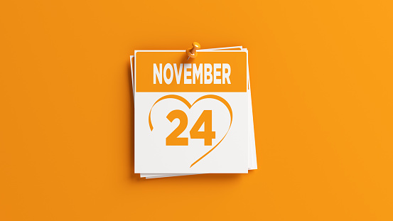 November 24 calendar on orange color background