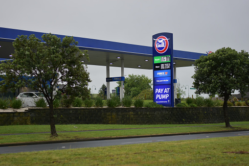 Auckland, New Zealand – November 05, 2020: View of Gull petrol station with self service at Te Irirangi Drive on cloudy day
