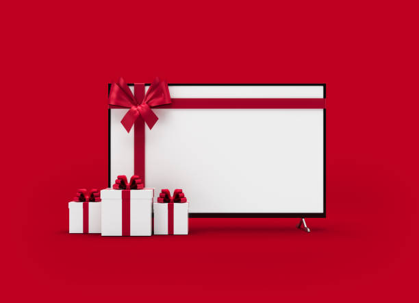 Tv screen gift boxes and red color ribbon on red color background stock photo