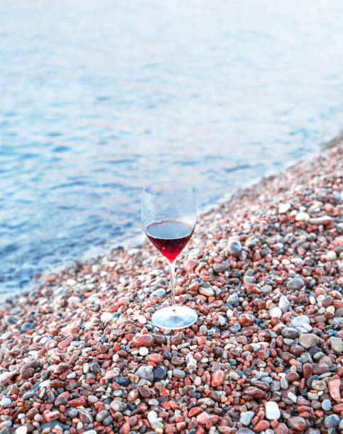 istock glass with red wine on the shores 1437736816