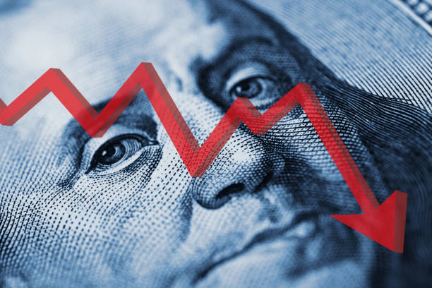 istock US dollar bill with red stock market chart arrow going down 1437737266