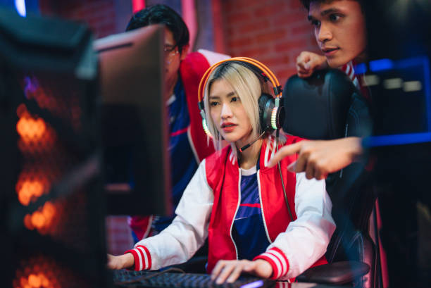 istock Pro gamers play in computer video game and win championship. 1437737752