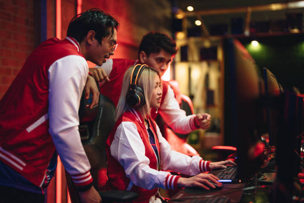 istock Pro gamers play in computer video game and win championship. 1437737757