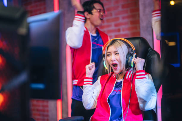 istock Pro gamers play in computer video game and win championship. 1437737758