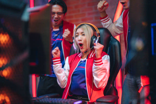 istock Team professional gamer playing winning tournaments online games computer. 1437737777