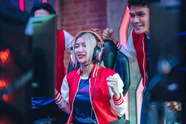 istock Team professional gamer playing winning tournaments online games computer. 1437737798