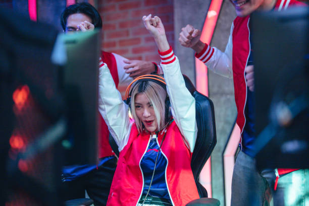 istock Pro gamers play in computer video game and win championship. 1437737808