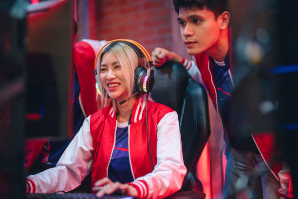 istock Pro gamers play in computer video game and win championship. 1437738328
