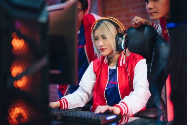 istock Team professional gamer playing winning tournaments online games computer. 1437738344