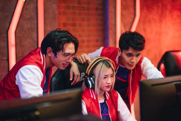 istock Pro gamers play in computer video game and win championship. 1437738853