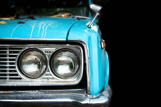 istock Old blue classic car with headlight.Old blue classic car with headlight, copy space. 1437741944