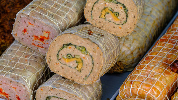istock Stuffed chicken roll with cheese and sage and many other fresh spices. selective focus 1437742027