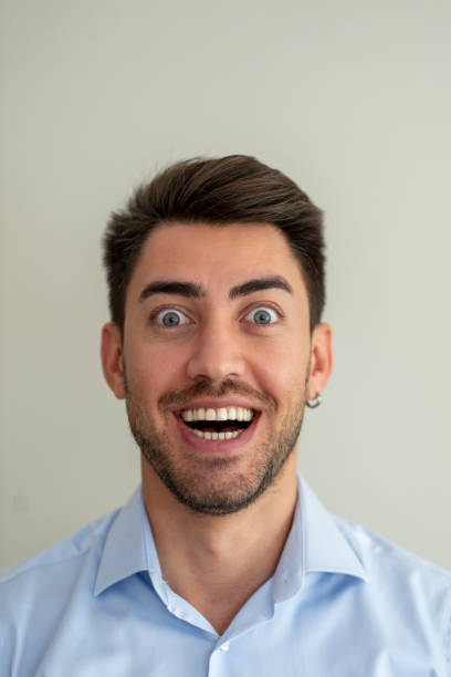 istock portrait of handsome young man 1437745780