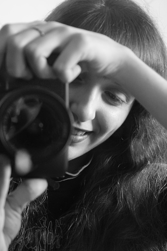 Portrait of a pretty eight-year-old brunette looking happy.