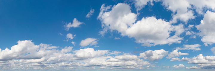 A panoramic sky with white clouds in summer.