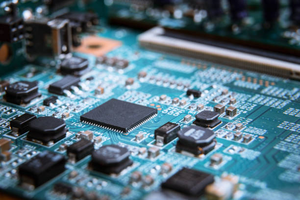 istock Abstract close-up on theMicrochip on blue circuit board 1437748354