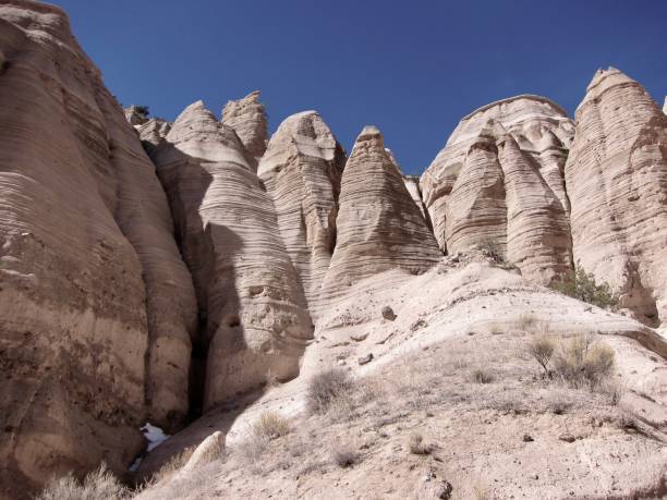 kasha-katuwe tent rocks national monument sheltering a patch of snow - jemez mountains imagens e fotografias de stock