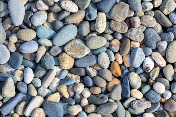 istock Top view of colored large pebbles. 1437749575