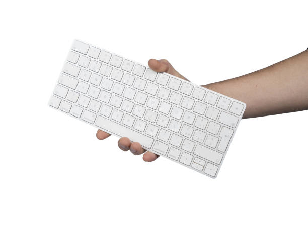 istock a keyboard in a male hand 1437762399