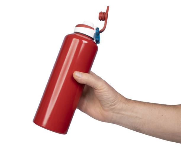 istock a red aluminum bottle in a men's hand 1437762417