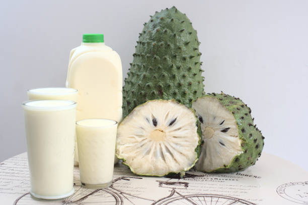 Fresh smoothie made of custard apple A fresh smoothie made of custard apple annona muricata stock pictures, royalty-free photos & images