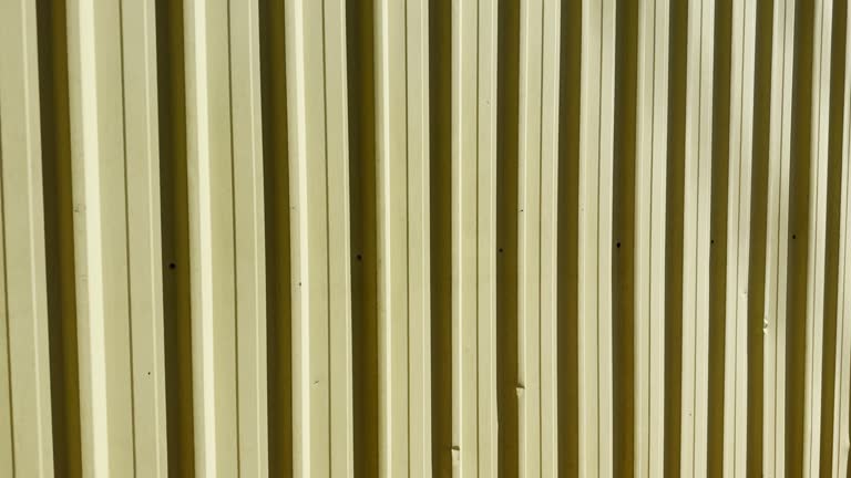 Yellow Corrugated Iron Factory Wall