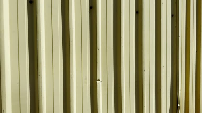 Yellow Corrugated Iron Factory Wall