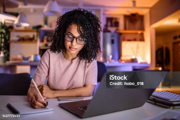 Few More Minutes And I Am Done For Tonight Stock Photo - Download Image Now - Laptop, Learning, Student