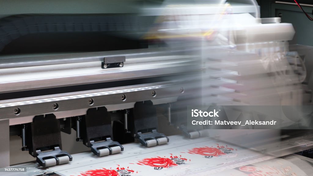 Moving industrial printing modern digital inkjet printer Industrial printing modern digital inkjet printer Textile Stock Photo
