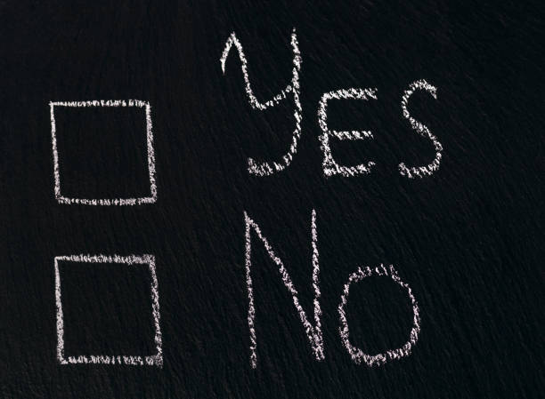 istock Chalk writing on rough board or asphalt yes no with check mark option 1437781176