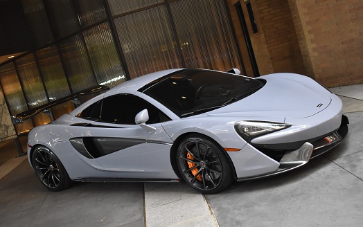 Houston, TX USA October 30, 2022 - McLaren 570 S Sports car parked in the downtown financial district of Houston