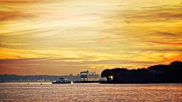 istock Boats in New York Harbor at sunset 1437788838