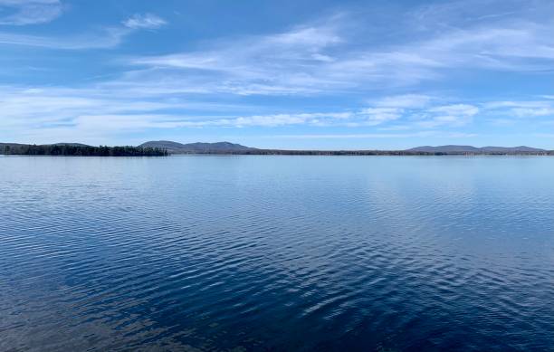 Calm Lake view View of lake Brome on sunny late fall day with hills in background knowlton stock pictures, royalty-free photos & images