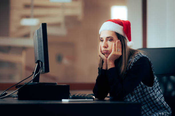 istock Unhappy Office Employee Working on Christmas Eve 1437791673