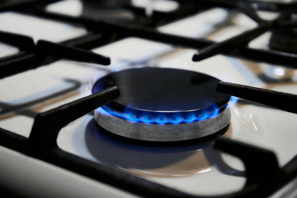 istock Kitchen gas burner, close-up. Burning gas 1437793086