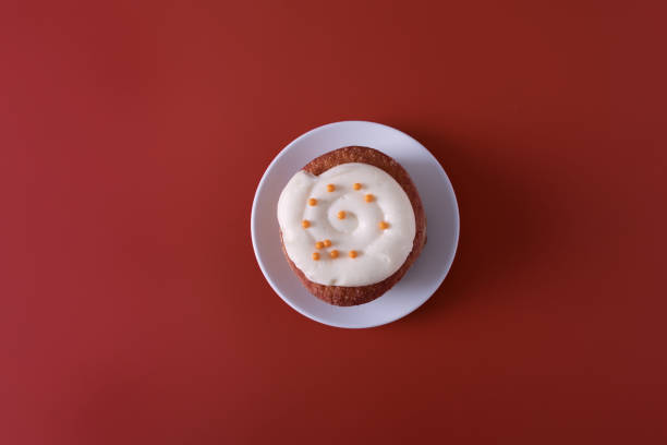 Autumn-Themed Mini pumpkin Cakes with Seasonal Decorations on White Background