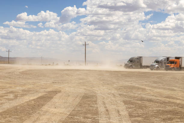 istock Semi-trucks in desert 1437796784