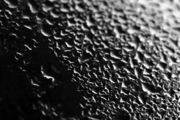 istock Abstract black background that looks like dull lava bubbles (Retouched and color manipulated image) 1437804170