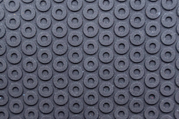 istock Seamless black studded rubber floor panels for texture or background 1437809441