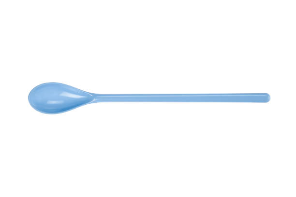istock Blue plastic spoon isolated on white background with clipping path. 1437811775