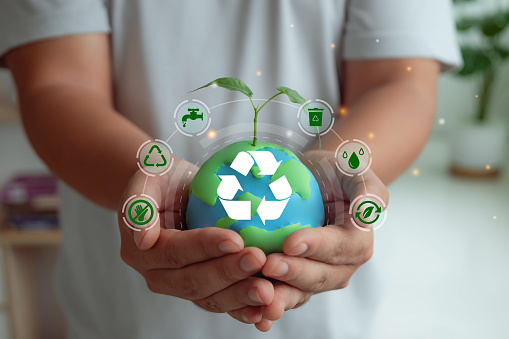Zero waste,World sustainable environment concept.Environmental and Ecology Care. Reuse Reduce Recycle symbol.Conscious consumption. Waste management. Earth day banne. Hand  holding  earth.