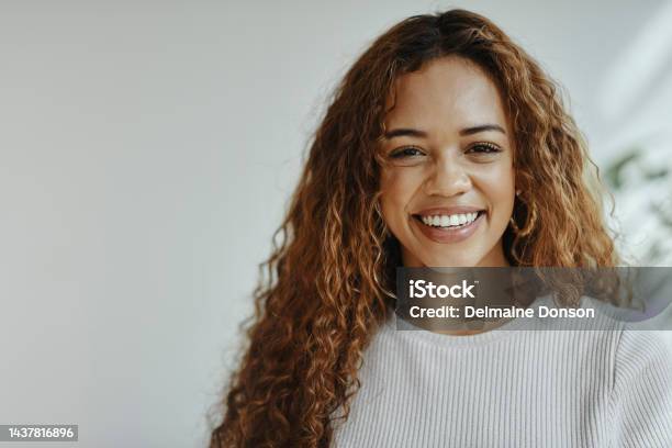 Face Portrait And Happy With A Black Woman Feeling Positive Carefree Or Cheerful Inside With A Smile Hair Teeth And Beauty With An Attractive Young Female Posing With Mockup For Advertising Stock Photo - Download Image Now